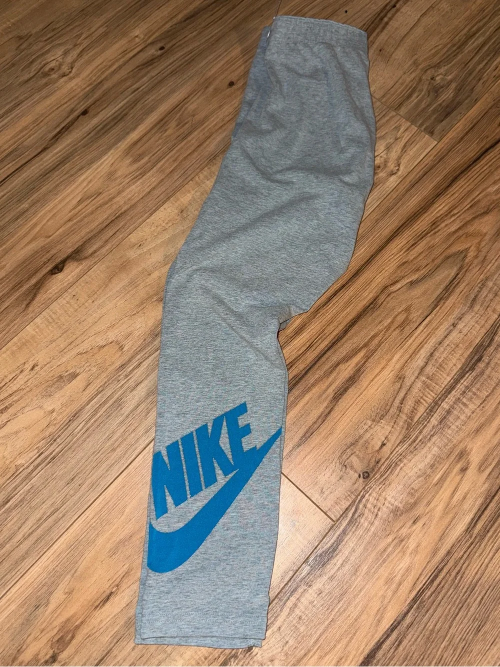Nike Gray leggings with Blue Swoosh Logo